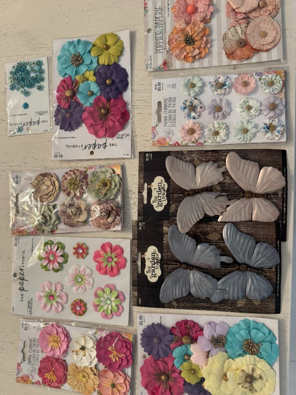 Butterflies and Floral Embellishments, 10 pkgs, various colors, NWT